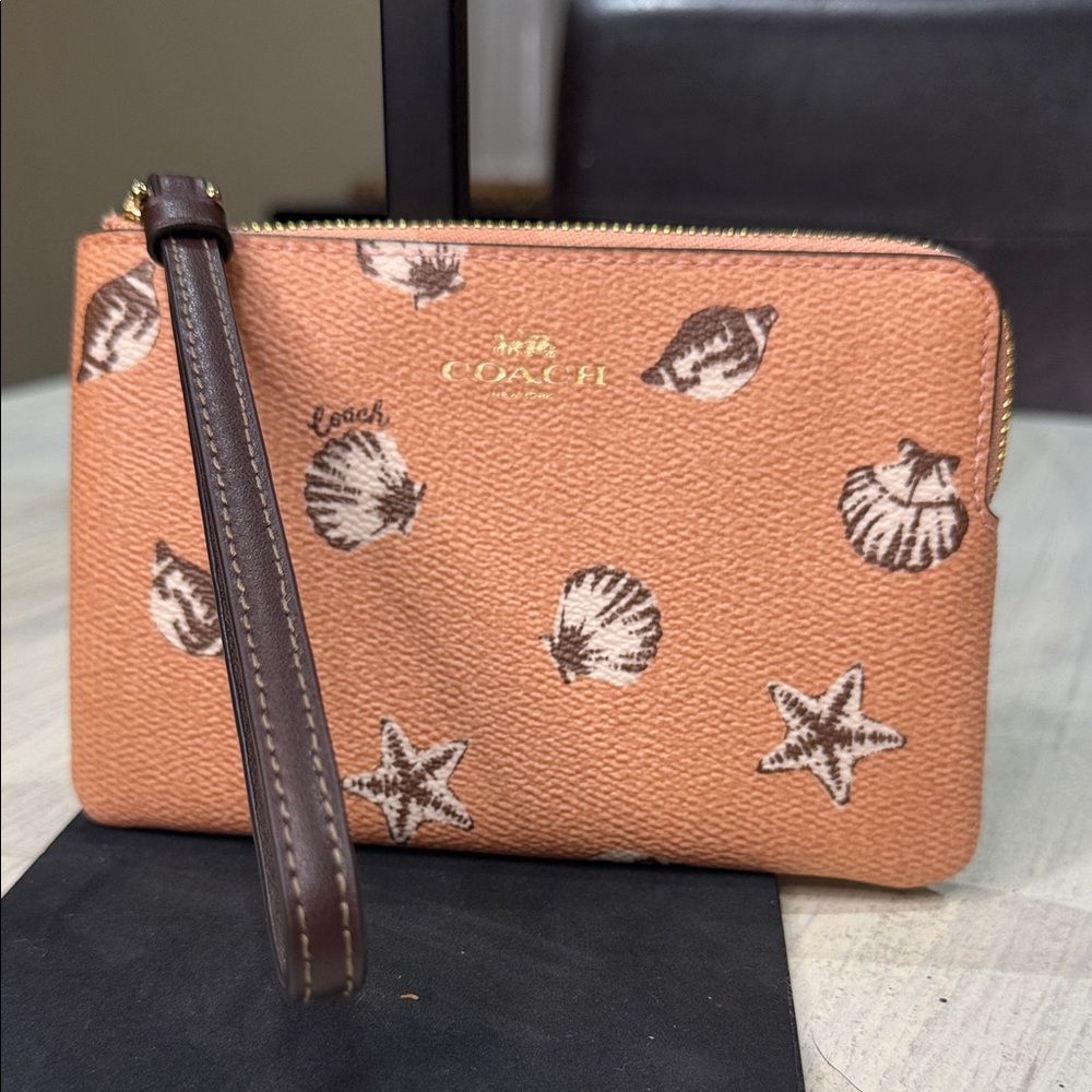 Coach Coral Seashell Pattern Wristlet